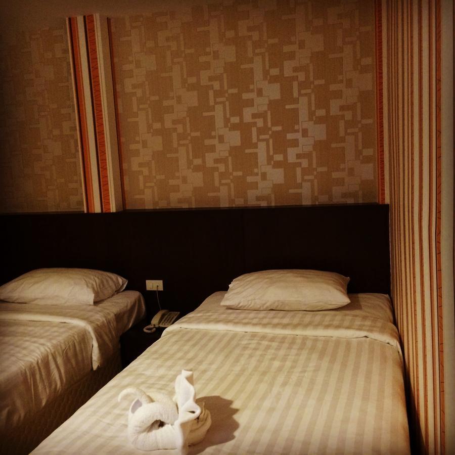 Iraqi Hotel Makkasan Екстер'єр фото